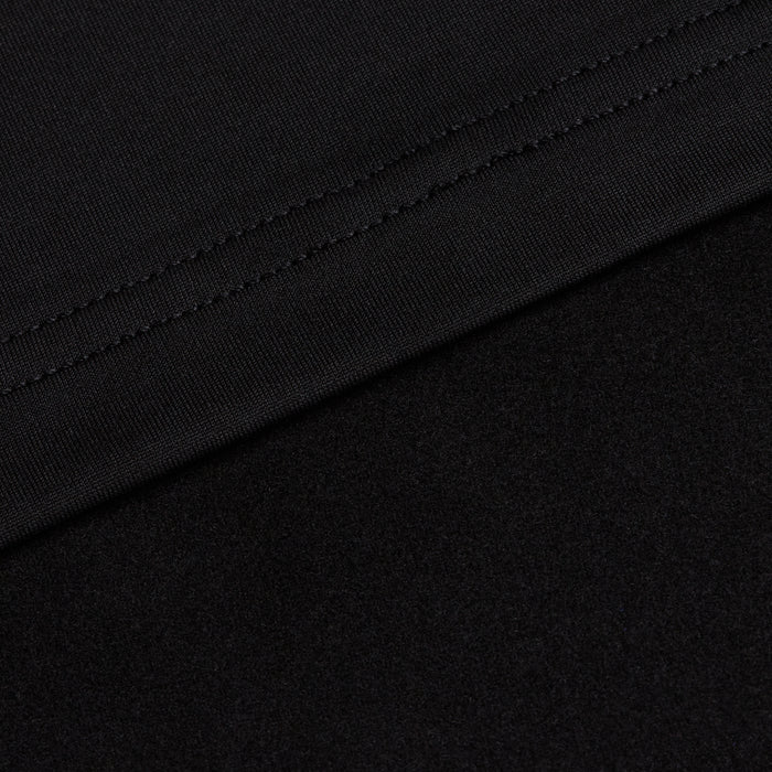 Close-up of two black fabrics from Black - Hoodie: the top shows smooth, woven fabric with stitching, while the bottom displays a soft, matte, fleece-like texture. Both moisture-wicking fabrics meet diagonally for comfort and performance.