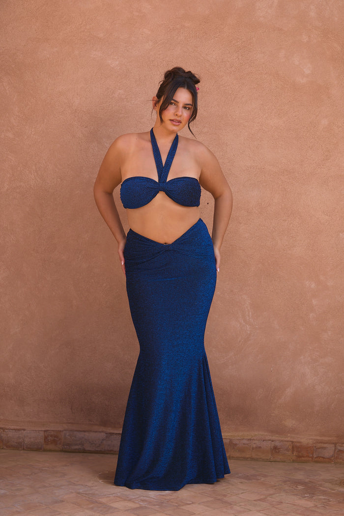 a woman in a blue dress