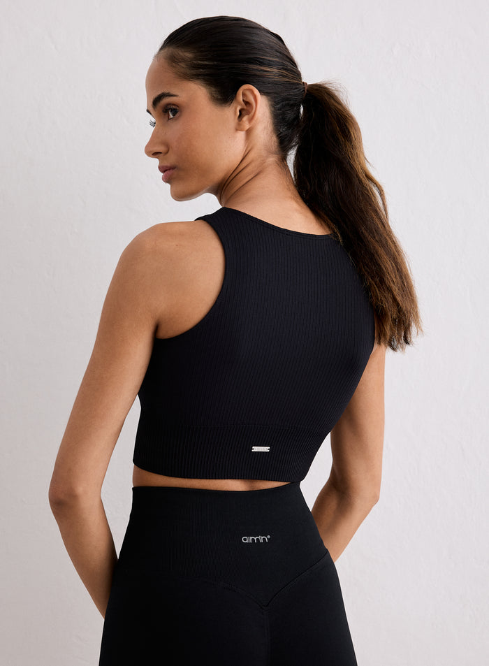 Back view of a woman wearing a Black Ribbed Seamless Crop Top [XS-170cm]