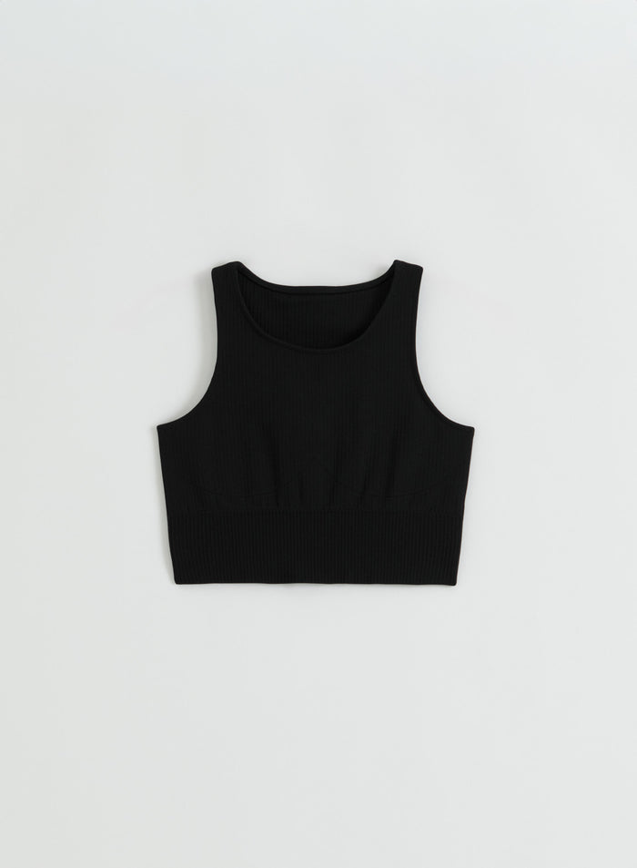 Flat lay of the black Ribbed Seamless Crop Top from aim'n