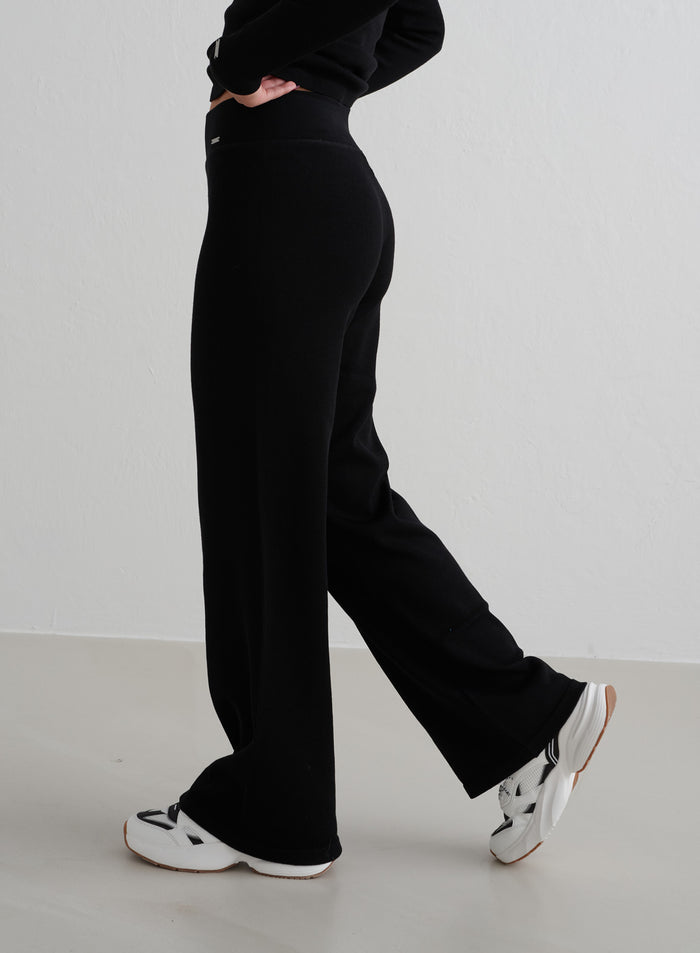 Black high-waisted ribbed wool petite wide pants by aim'n, viewed from the side. [XS - 162 cm]