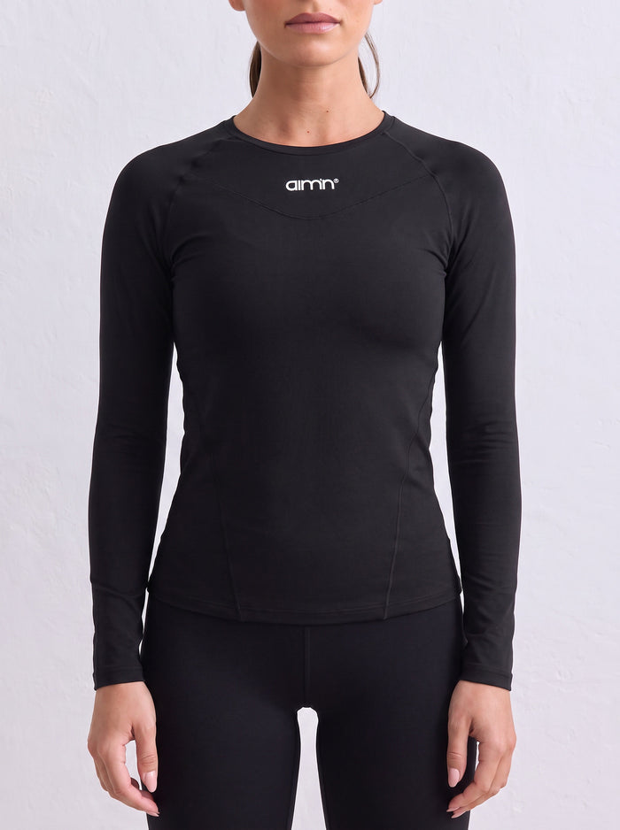 Black aim'n Soft Basic Long Sleeve featuring raglan sleeves and a print logo