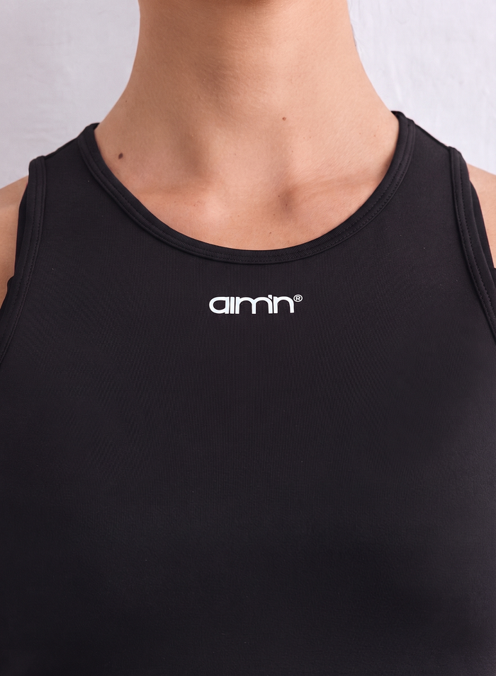 Black Soft Basic Singlet from aim'n, shown from the back with a regular fit and round neckline.