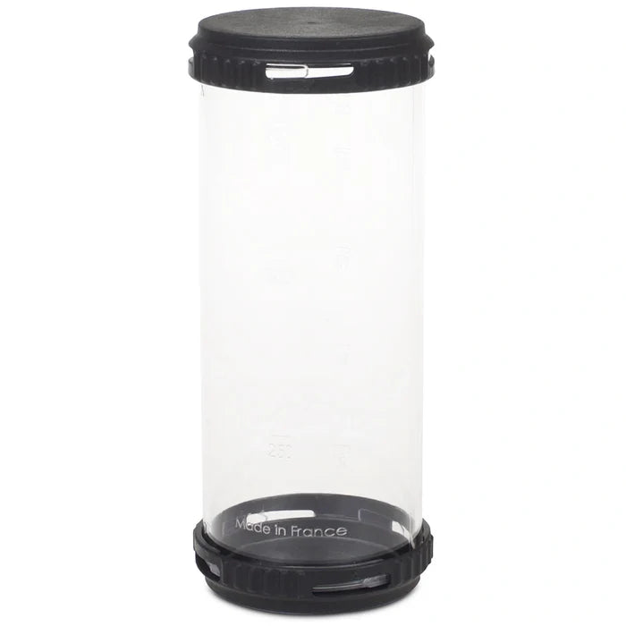 A pressure syringe with a clear container on a white background.