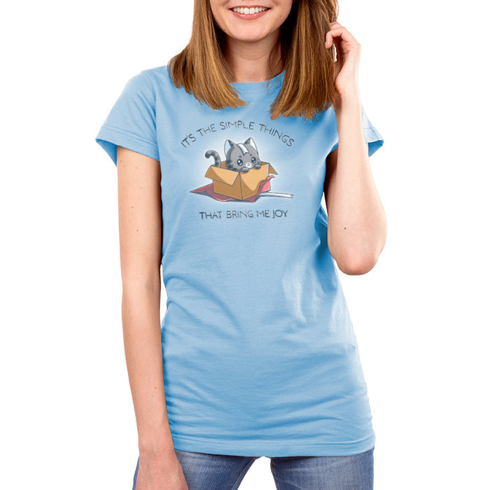 Premium Cotton T-shirt_TeeTurtle light blue Purr Box of Joy apparel featuring a gray cat in an unwrapped box with wrapping paper and ribbons, and the caption, “It’s the Simple Things That Bring Me Joy“.