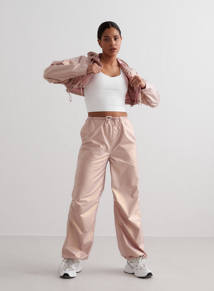 Rosé metallic cropped jacket with an adjustable hood and matching pants by aim'n. [S - 175 cm]